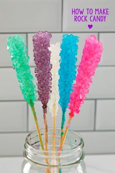 colorful candy sticks in a jar with the words how to make rock candy on it