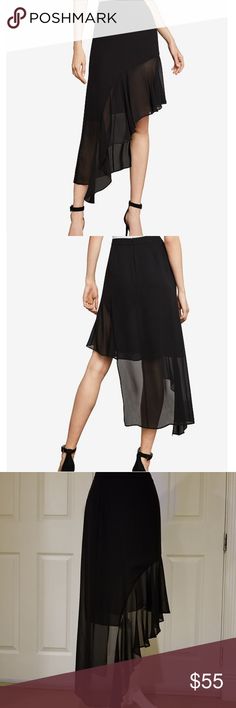 NWT BCBG ASYMMETRICAL RUFFLE SKIRT IN BLACK On-trend styling cues define this expressive silhouette crafted from airy georgette and featuring an eye-catching sheer panel and asymmetric ruffles.  Hidden back zipper closure  Asymmetrical hemline; cascading ruffle detailing  Polyester micro georgette; lining: polyester crepe de chine  Waist to shortest hem measures approx 23" in length and to longest hem 45" in length  Retailed: $158 BCBGMaxAzria Skirts Asymmetrical Edgy Asymmetrical Hem Summer Skirt, Chic Cocktail Skirt With Asymmetrical Hem, Chic Asymmetrical Cocktail Skirt, Black Asymmetrical Hem Bottoms For Evening, Black Asymmetrical Bottoms For Night Out, Black Asymmetrical Wrap Skirt For Summer, Chic Asymmetrical Draped Skirt For Night Out, Evening Bottoms With Asymmetrical Hem For Spring, Summer Evening Asymmetrical Skirt