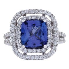 Stamped: 18K White Gold Total Ring Weight: 6.5 Grams Ring Length: N/A Ring Width: N/A Gemstone Weight: Total Natural Tanzanite Weight is 3.03 Carat (Measures: 8.45x8.30 mm) Color: Blue Diamond Weight: Total Natural Diamond Weight is 0.90 Carat Color: F-G, Clarity: VS2-SI1 Face Measures: 16.05x15.35 mm Sku: [702353W] 14k White Gold Diamond Ring, Tanzanite Diamond Ring, Tanzanite Diamond, Blue Tanzanite, Gold Diamond Ring, White Gold Diamond Rings, Natural Tanzanite, Blue Diamond, Cocktail Rings