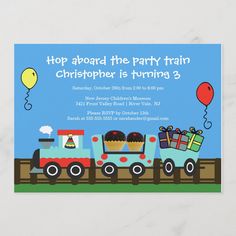 a train birthday party with balloons and presents