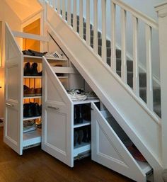 an under the stairs shoe storage area