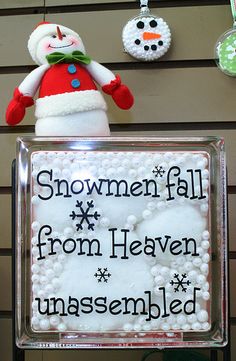 a snowman fall from heaven unassembled sign