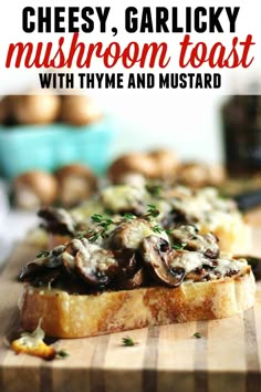 mushroom toast with thyme and mustard on a cutting board