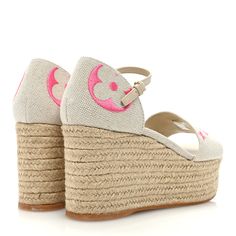 This is an authentic pair of LOUIS VUITTON Canvas Monogram Starboard Espadrille Wedge Sandals size 38 in Rose Pop. These stunning wedges have an espadrille platform that is more than 1.75 inch at the toe and 3.25 inches at the heel. There is a beige leather insole and strappy cotton canvas Louis Vuitton monogram with pink accents, toe straps and beige leather ankle straps. Espadrilles Platform, Espadrille Wedge, Pink Accents, Ankle Straps, Espadrilles Wedges, Wedge Sandals, Louis Vuitton Monogram, Cotton Canvas, Espadrilles