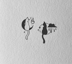 two cats that are standing next to each other on some paper with water drops coming from them