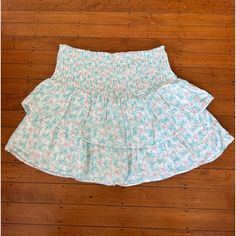 Gorgeous Floral Skirt! Never Worn, Tag Was Taken Off. Super Cute! Light Blue Lined Skirt For The Beach, Light Blue Lined Skirt For Vacation, Light Blue Tiered Skirt For Vacation, Light Blue Summer Skirt For Spring, Light Blue Mini Skirt With Elastic Waistband, Light Blue Tiered Skirt With Lining, Light Blue Tiered Mini Skirt For Day Out, Light Blue Skirt For Spring And Summer, Light Blue Mini Skirt For Spring Vacation