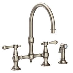 a kitchen faucet with two handles and nozzles