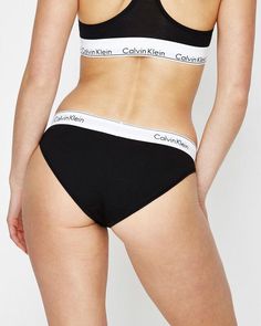 The Modern Cotton Bikini Briefs by Calvin Klein are a classic cut brief made of a soft cotton blend fabric. This style sits on the hips and features a thick elastic waistband with Calvin Klein branding and a regular fit. Teen Shopping, Destination Dress, Cotton Blend Fabric, Skirted Swimwear, Denim Shop, Playsuit Jumpsuit, T Shirt Top, Denim Women, Jean Coat