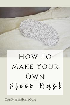 a sleeping mask on top of a bed with the words how to make your own sleep mask