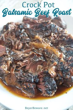 crock pot balsamic beef roast on a white plate