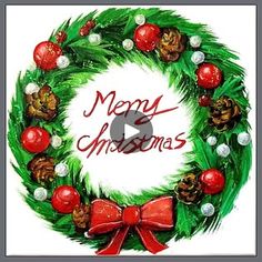 a christmas wreath with red bows and pine cones on it is featured in the video