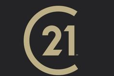 the number twenty one in a circle on a black background with white and gold lettering