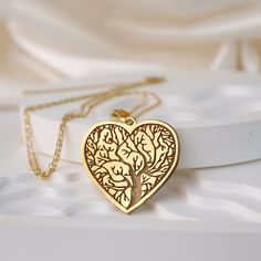 This Tree of Love Necklace is the perfect symbol of everlasting love and strong roots. Handcrafted with care, this beautiful necklace features a stunning tree charm with delicate branches and roots, representing the unbreakable bond of love. The intricate design is perfect for nature lovers and makes a thoughtful gift for a special someone or a beloved family member. Wear this necklace close to your heart and feel the love and connection with each wear. Add a touch of nature-inspired beauty to y Nature-inspired Jewelry For Mother's Day Anniversary, Nature-inspired Jewelry For Anniversary And Mother's Day, Sterling Silver Nature-inspired Necklace For Anniversary, Nature-inspired Sterling Silver Necklace For Anniversary, Tree Of Life Necklace For Anniversary, Mother's Day, Tree Of Life Necklace For Anniversary And Mother's Day, Tree Of Life Necklace For Anniversary On Mother's Day, Mother's Day Tree Of Life Necklace Gift For Mom, Tree Of Life Pendant Necklace As Gift