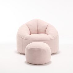 a pink chair and foot stool sitting on top of a white floor next to each other