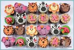 the cupcakes are decorated with animals and letters that spell out love on them