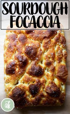 a square piece of bread with the words sourdough focaccia above it