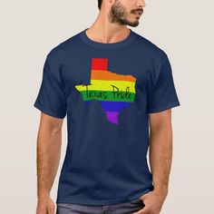 a man wearing a t - shirt with the word texas in rainbow colors on it