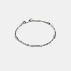 Part of our Men’s Jewelry Collection this sterling silver curb chain bracelet is detailed with iconic Coach motifs for heritage style. It’s finished with an easy clasp closure. | Coach Hallmark Bracelet - Silver Heritage Fashion, Hallmark, Silver Bracelets, Chain Bracelet, Bracelets For Men, Bracelet Watch, Jewelry Watches, Mens Jewelry, Jewelry Collection