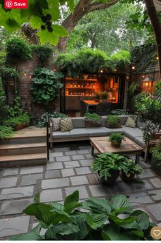 an outdoor living area with lots of greenery