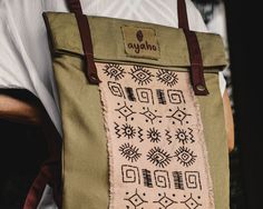 Comfy ethnic / boho / tribal style backpack made of natural canvas. Firm, durable, reliable. Decorated with embroidery by hand. It will serve you for many years. ▫️The hidden side has a pocket for your valuable items, keys and phone. Additionally there is a small pocket inside the main section. ▫️Closes with snap fasteners, two magnets on the sides. ▫️The length of the strap is adjustable. This duffel bag continues the series of shamanic clothing by «Ayaho». We aim to make unique items and care Cheap Bohemian Backpack For Daily Use, Affordable Bohemian Backpack With Adjustable Strap, Cheap Bohemian Standard Backpack, Cheap Bohemian Backpack With Adjustable Strap, Cheap Bohemian Backpack, Shamanic Clothing, Embroidery By Hand, Bohemian Backpack, Hippie Backpack