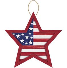 an american flag star ornament hanging on a string