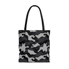 "This is a great and fun Chic Grey and Black Camouflage Design, Traveler, Nurses Bag, School Teacher Student Book, Workout Gym, Travel AOP Tote Bag for you or your loved that absolutely obsessed with all things camouflage, etc.! Great AOP Tote to take on vacations, airport travel, library, gym, office, school, etc.!! 😊  This practical, high-quality Tote Bag is available in three sizes. All over print provides comfort with style at the beach or out in town. Made from reliable materials, lasting for seasons. 💖 100% Polyester 💖 Boxed corners 💖 Black inner stitching, transparent thread on hems. 💖 Black cotton handles 💖 With non-woven laminate inside 💖 NB! Size tolerance 0.75\" (1.9 cm)) 💖 Assembled in the USA Care instructions Remove all items from the bag before cleaning. Suggested to Black Camouflage, Student Book, Nurse Bag, Camouflage Design, Airport Travel, Teacher Student, Bag School, Soft Bristle Brush, Workout Gym