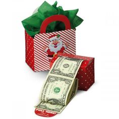 a red and white gift bag with money in it