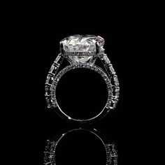 a diamond ring on a black background