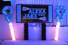 balloons are placed in front of a sign that says,'alex and jake '