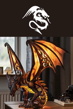 a dragon lamp sitting on top of a wooden table