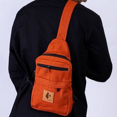 This crossbody bag is your ultimate adventure buddy for both city excursions or the outdoors. Made with ethically-sourced water-resistant canvas, it has clips on both sides so you can wear it over your left or right shoulder, front or back.   Inside, you'll discover a spacious main compartment with a convenient divider, plus two handy pockets on the front for quick access. Oh, and here's the kicker: there's even a sneaky hidden zippered pocket in the back for some extra security. ✔Crafted from 1 Casual Adventure Backpack Shoulder Bag, Outdoor Canvas Backpack With Adjustable Strap, Outdoor Canvas Chest Bag With Adjustable Strap, Crossbody Backpack With Pockets For Outdoor Activities, Outdoor Crossbody Backpack With Pockets, Canvas Shoulder Bag Backpack For Outdoor Activities, Canvas Chest Bag With Adjustable Strap For Outdoor Activities, Outdoor Canvas Chest Bag With Pockets, Functional Outdoor Canvas Chest Bag