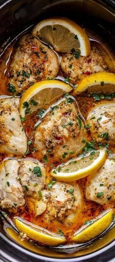 chicken with lemons and herbs in a slow cooker