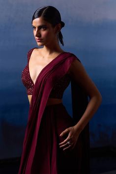 Wine pre-draped saree in georgette base. Paired with an embroidered blouse. - Aza Fashions Burgundy Saree, Saree Gowns, Cotton Sarees Handloom, Wedding Guest Attire, Draped Saree, Saree And Blouse, Ruffle Saree, Vacuum Storage, Drape Saree