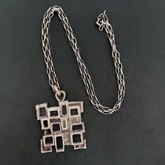 "A FABULOUS Brutalist Mid-Century chunky pendant in sterling silver cIrca 1960. Even more fabulous? There is a matching bracelet AND ring! There will be listings for these shortly or feel free to email me for pics! Pendant measures 2\" length, chain measures 23\". Not stamped or signed but tested. In excellent condition! All purchases from Bavier Brook arrive in an elegant box, fully wrapped in fine paper. Please inquire for international shipping. Don't hesitate to ask if you have any questions Brutalist Jewelry, Chunky Pendant, Bracelet And Ring, Matching Bracelet, Dream Ring, Dream Jewelry, Matching Bracelets, Antique Jewelry, Jewelry Necklace Pendant