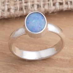 Opal's intense beauty is perfectly showcased in this ring by Caine. He sets the fascinating gem on sterling silver its elegance benefiting from the rich contrast between metal and gem. .925 Sterling silver Laos Jewelry, Opal Solitaire Ring, Ring Pictures, Single Stone, Pretty Rings, Opal Ring, Favorite Rings, Birthstone Ring, Opal Rings