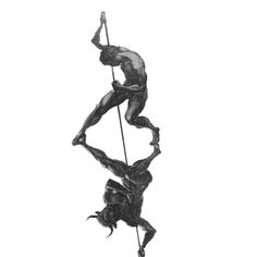 two men are climbing up the side of a pole with one holding on to another man