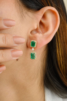 3.77 Carat Real Emerald and Halo Diamond Dangle Earrings in 18K Gold will make a statement about your style. You'll need dangling earrings to make a statement with your attire. These earrings, made of octagon cut emeralds and round cut diamonds, give a glittering, sumptuous appeal.
Emerald boosts a person's intellectual capacity.
Designed with an octagon cut emerald and a halo of diamonds dangling down the emerald, as well as a diamond halo stud joined with a diamond in the center of solid gold. Luxury Green Diamond Halo Earrings, Gia Certified Formal Drop Earrings, Gia Certified Dangle Earrings For Formal Events, Gia Certified Dangle Earrings For Formal Occasions, Gia Certified Diamond Drop Earrings, Elegant Gia Certified Drop Earrings, Gia Certified Dangle Earrings, Earrings To Make, Halo Diamond Earrings