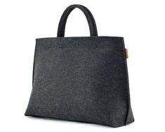 This is a designed and made by me dark gray large felt bag with handles. It is made out of strong, technical felt, 4mm thick. Simple, minimalist design. Zipper closure purse / big size felted crossbody handbag / light gray long strap work bag. The bag looks really nice. Measurements: height 30 cm/ 12 inch depth max 15 cm/ 6 inch maximum width 45 cm/ 17.8 inch The bag has a zip closure. It was made taking care of each small detail. The bag stands on it's own. - 2 zippered pocked inside, - 1 mobil Wool Tote Bag For Daily Use, Daily Use Wool Tote Bag, Everyday Felt Tote Bag, Wool Tote Bag For Everyday Use, Rectangular Felt Bags For Daily Use, Rectangular Felt Travel Bag, Rectangular Felt Shoulder Bag For Daily Use, Daily Use Rectangular Felt Shoulder Bag, Felted Handbags