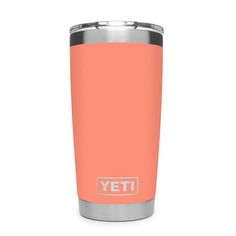 the yeti tumbler cup is shown in an orange and silver color, with its lid