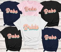 Bride Babe T Shirt Bride Shirt Bachelorette Party Shirt Babe Shirt Bride Gift Hen Party Shirt Wedding Shirt Gift For Bride Bridal tshirtSIZE GUIDE Adult Unisex T Shirts       S : 34"- 36" | M : 38"- 40" | L : 42"- 44" | XL : 46"- 48" | XXL : 50"-52" |       XXXL : 54" - 56"Unisex T-shirts Conversion To Women Dress Size     S: UK 8-10 , USA 4-6 , Europe 34-36      M: UK 12-14 , USA 8-10 , Europe 38-40     L: UK 14-16, USA 10-12 , Europe 40-42      XL : UK 18-  20 , USA 14-16, Europe 44-46      2X Matching Kids Outfits, Bride Bachelorette Shirts, Bride Tribe Shirt, Bride Squad Shirt, Babe T Shirt, Bachelorette Party Shirt, Wedding Shirt, Babe Shirt, Brides Babes