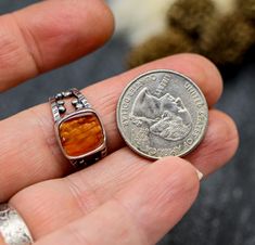 Spiny oyster ring in my bubble band. This band isn't too wide but it has all the charm of it's bigger sister band. The stone, which is actually a shell, has this fantastic orange color. It kinda shimmers in the sun too, check out the video you can sorta see it in that. ♦Size: 9 ♦ Metal: Sterling silver Spiny Oyster Ring, Orange Sterling Silver Ring, Sterling Silver Orange Ring With Polished Finish, Vintage Sterling Silver Oyster Bracelet, Spiny Oyster Jewelry Native American, My Bubble, Spiny Oyster, Ring Sterling Silver, Sterling Ring