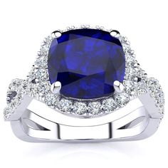 Sapphire Rings | September Birthstone | 3 1/2ct Cushion Cut Sapphire and Halo Diamond Ring With Fancy Band In 14K White Gold | SuperJeweler Luxury Cushion Cut Sapphire Ring With Halo Design, Cushion Cut Sapphire Diamond Ring With Halo Setting, Cushion Cut Lab-created Sapphire Diamond Ring, Blue Cushion Cut Lab-created Sapphire Rings, Cushion Cut Lab-created Sapphire Ring With Halo Setting, Vintage Diamond Rings, Tanzanite Ring, Tanzanite Gemstone, Blue Gems