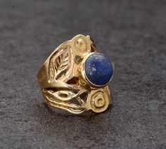 SIZE :- All Size Are Available. US1 TO US16, If Your Size Not Listed Feel Free to Contact us METAL :- Brass STONE;- Lapis Lazuli Ring can be customized on request and gemstone can be made to any gemstone you want. Same Design Ring Are Upload With Any Gemstone. Please Visit Our Shop to View Complete Collection. If You Need Faster Shipping, Please Contact us Please Make Sure to Include The Correct Address During Before Order. You Can return Item within 30 Days After Successful Delivery. We Offer 1 Adjustable Gold Flower Ring, Nature-inspired, Adjustable Gold Flower Ring Nature-inspired, Handmade Gold Flower Ring, Nature-inspired, Handmade Gold Flower Ring Nature-inspired, Nature-inspired Brass Rings For Gifts, Bohemian Hand Forged Promise Ring, Bohemian Brass Rings For Anniversary, Bohemian Metal Ring Jewelry For Anniversary, Bohemian Open Ring Flower Ring Gift