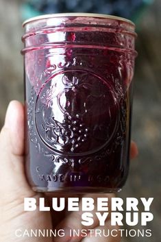 blueberry syrup in a mason jar with text overlay that reads, canning instructions