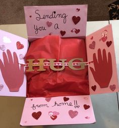 valentine's day card in a box with handprints