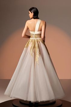 Description Off-White A-line, Long dress Sleeveless Open neckline Embroidered lace, Tulle Modifications Accepted Custom Measurements Accepted Dry Clean Evening Dress Made in Lebanon 812