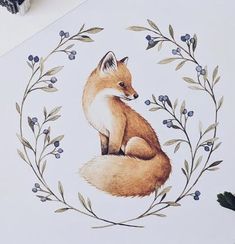 a drawing of a fox sitting on top of a table