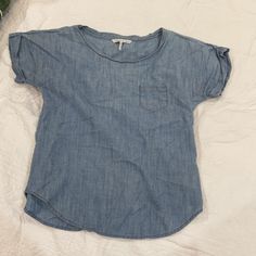 10/10 Condition Never Worn Xs But Fits S-M As It Fits Loose Depending On Body Type Cheap Washed Blue Tops With Buttons, Cheap Solid Blouse With Back Button Closure, Cheap Light Indigo Cotton Denim Top, Cheap Boyfriend Fit Cotton Denim Top, Cheap Denim Blue Chambray Top, Cheap Cotton Tops With Snap Buttons, Cheap Light Blue Tops With Button Closure, Cheap Medium Wash Cotton Tops, Cheap Chambray Tops With Button Closure