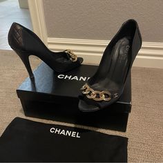 Chanel 100% Authentic! Black Grosgrain & Quilted Leather Open Toe Pumps Gold Tone Chain And Cc Logo. Size 37 1/2 Eu Or 7 1/2 Us. Made In Italy. Light Wear Present, Chanel Logo Missing From The Left Side Of The Pair But Nothing Too Noticeable. Comes With Box And Dustbag. Still Plenty Of Life Left To These! All Condition Is Pictured. Formal Heels With Chain And Round Toe, Leather Heels With Chain Strap For Night Out, Evening Chain Print High Heels, Party Heels With Leather And Chain Details, Luxury Chain Heels For Evening, Elegant High Heels With Chain Print, Elegant Evening Heels With Chain Print, Elegant Chain Print Heels For Evening, Formal Chain Print Heels