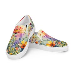 Wildflowers women's slip-on shoes. Our original wildflower watercolor art vibrantly reproduced on these super comfy, Vans style flats.  Made for comfort and ease, these Women's Slip-On Canvas Shoes are stylish and the ideal piece for completing an outfit. Equipped with removable soft insoles and rubber outsoles, it's also easy to adjust them for a better fit. Please be sure to check your foot measurements against the provided size chart as these tend to run a bit small. *  100% polyester canvas Multicolor Floral Print Slip-on Sneakers, Spring Multicolor Slip-on Sneakers, Multicolor Spring Slip-on Sneakers, Multicolor Slip-on Sneakers For Spring, Multicolor Slip-on Sneakers With Round Toe For Spring, Multicolor Low-top Slip-on Sneakers For Spring, Multicolor Slip-on Sneakers With Floral Print, Multicolor Slip-ons For Spring, Spring Multicolor Slip-on Sneakers With Rubber Sole